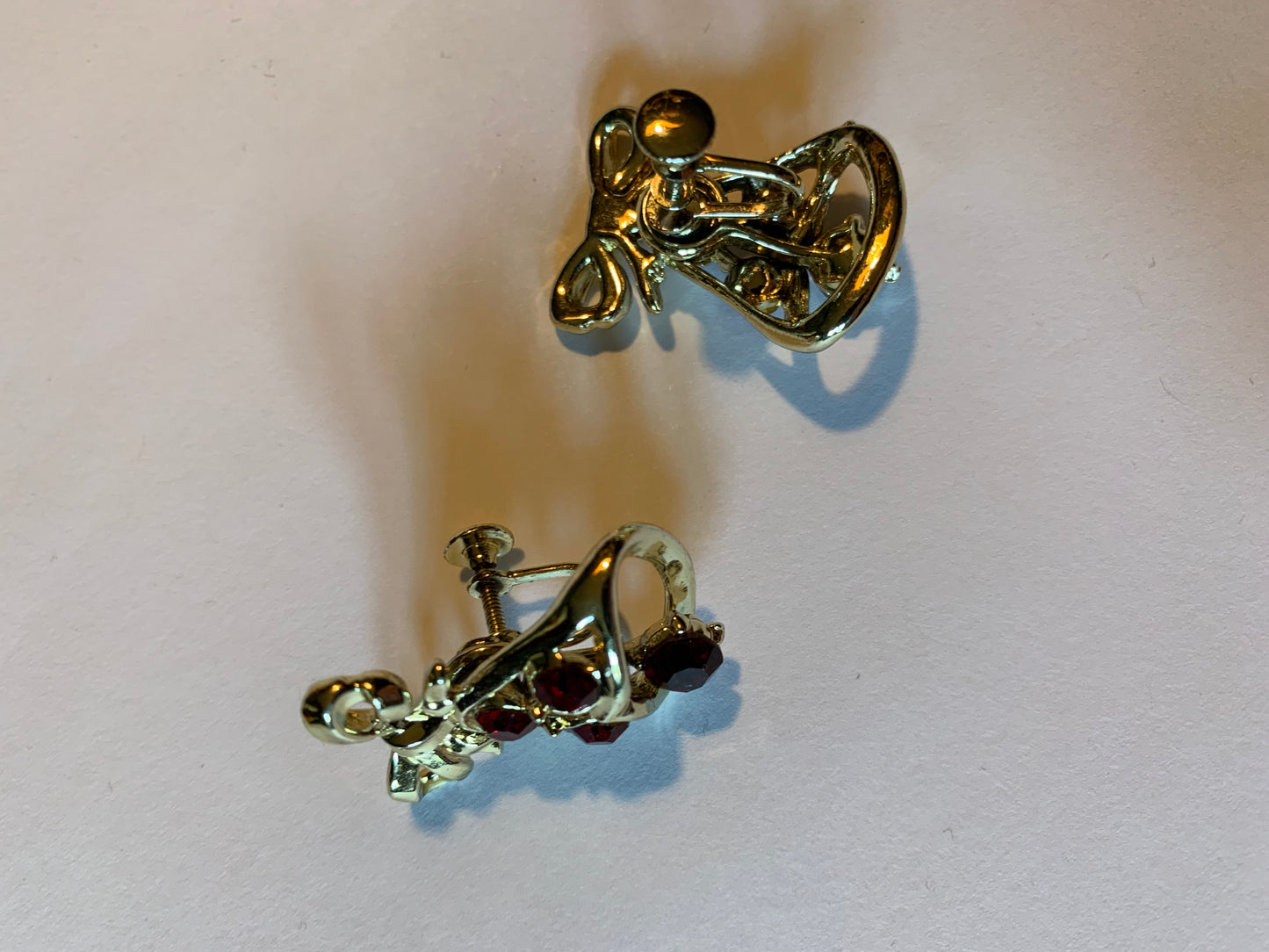 Red Rhinestone Golden Bell Articulated Clip Earrings circa 1960s