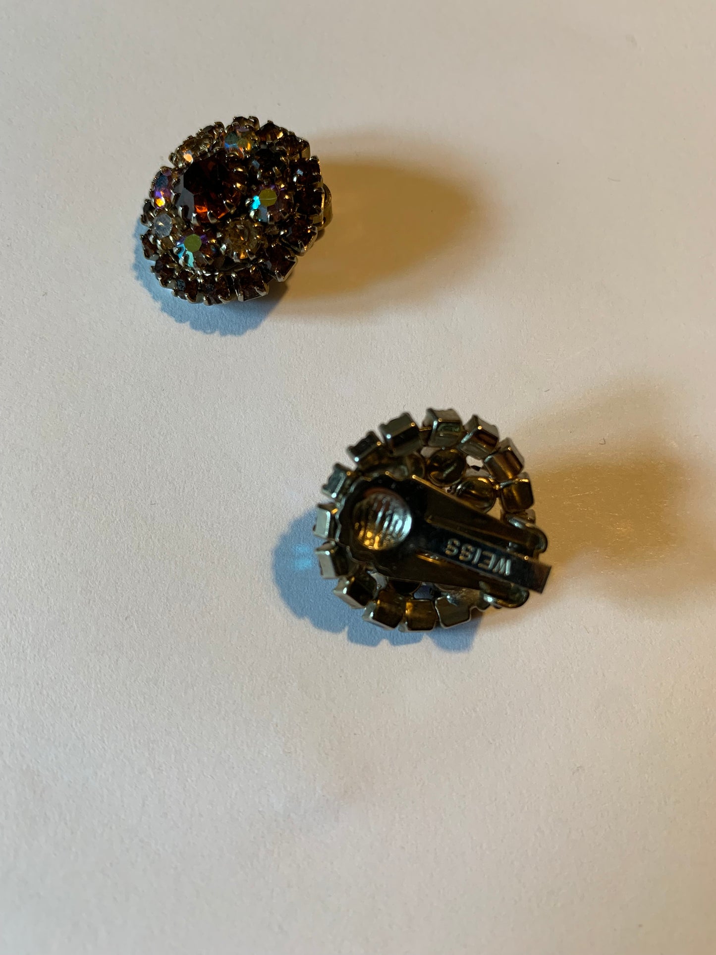 Dark Honey Rhinestone Circle Clip Earrings circa 1960s Weiss