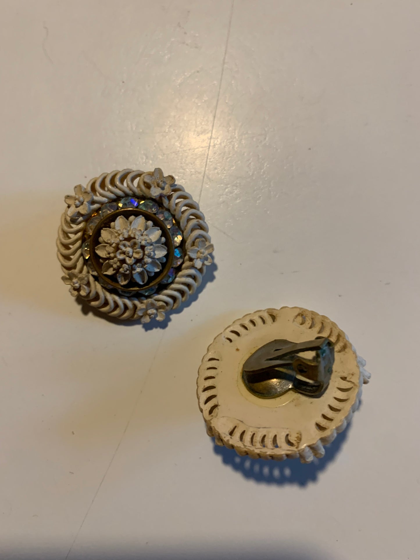 Ivory Carved Celluloid Medallion Earrings with Rhinestones circa 1940s