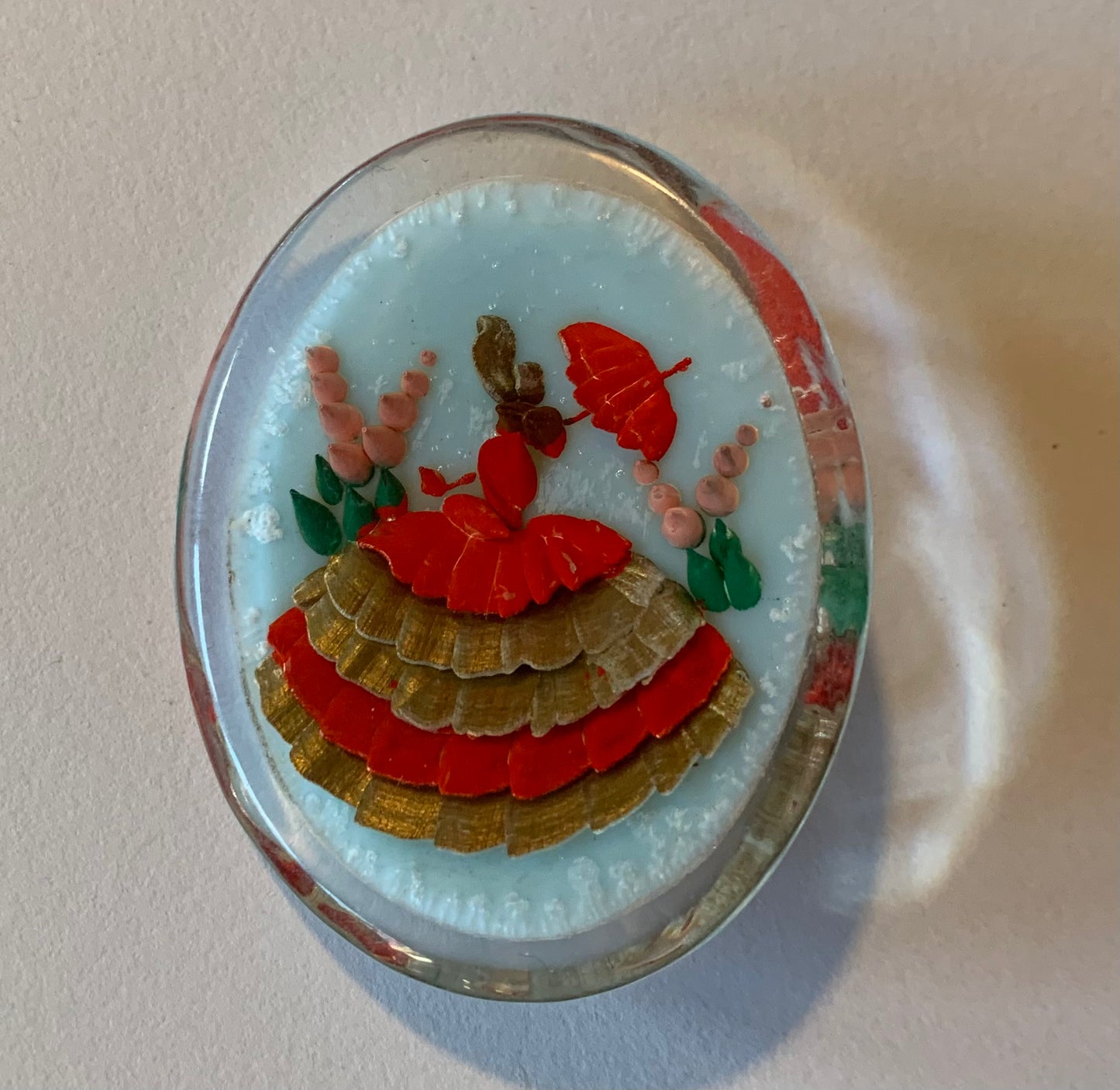 Victorian Lady with Parasol in Hollyhocks Lucite Brooch circa 1940s