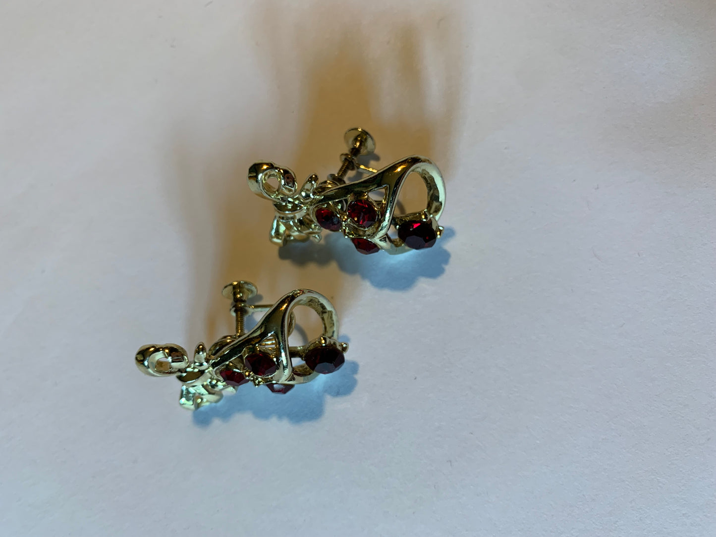 Red Rhinestone Golden Bell Articulated Clip Earrings circa 1960s
