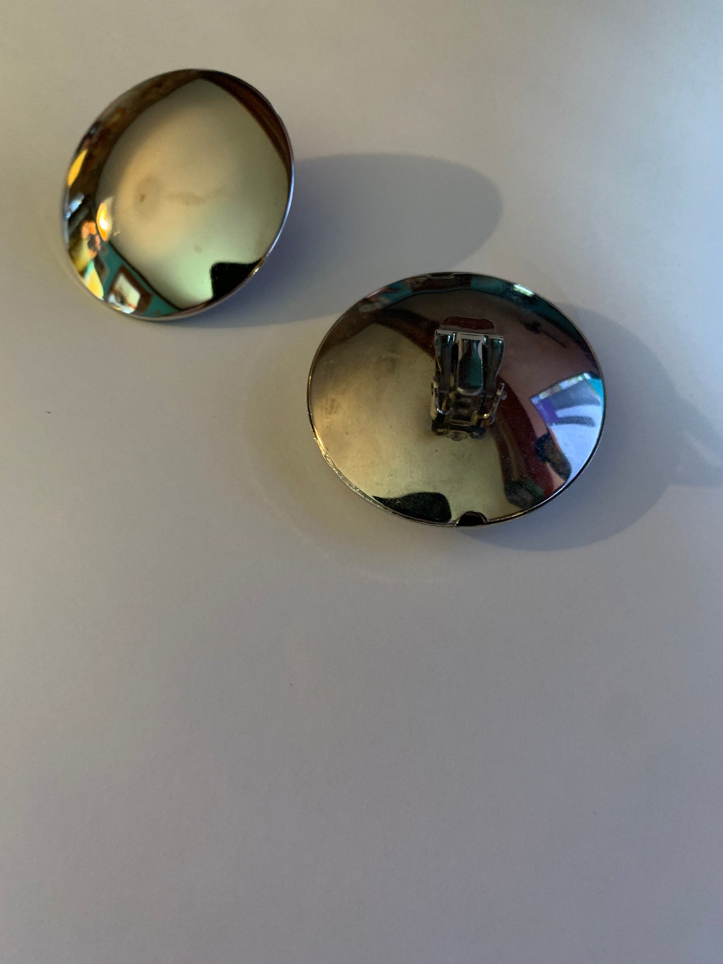Huge Silver Tone Mirrored Curved Disc Clip Earrings circa 1980s
