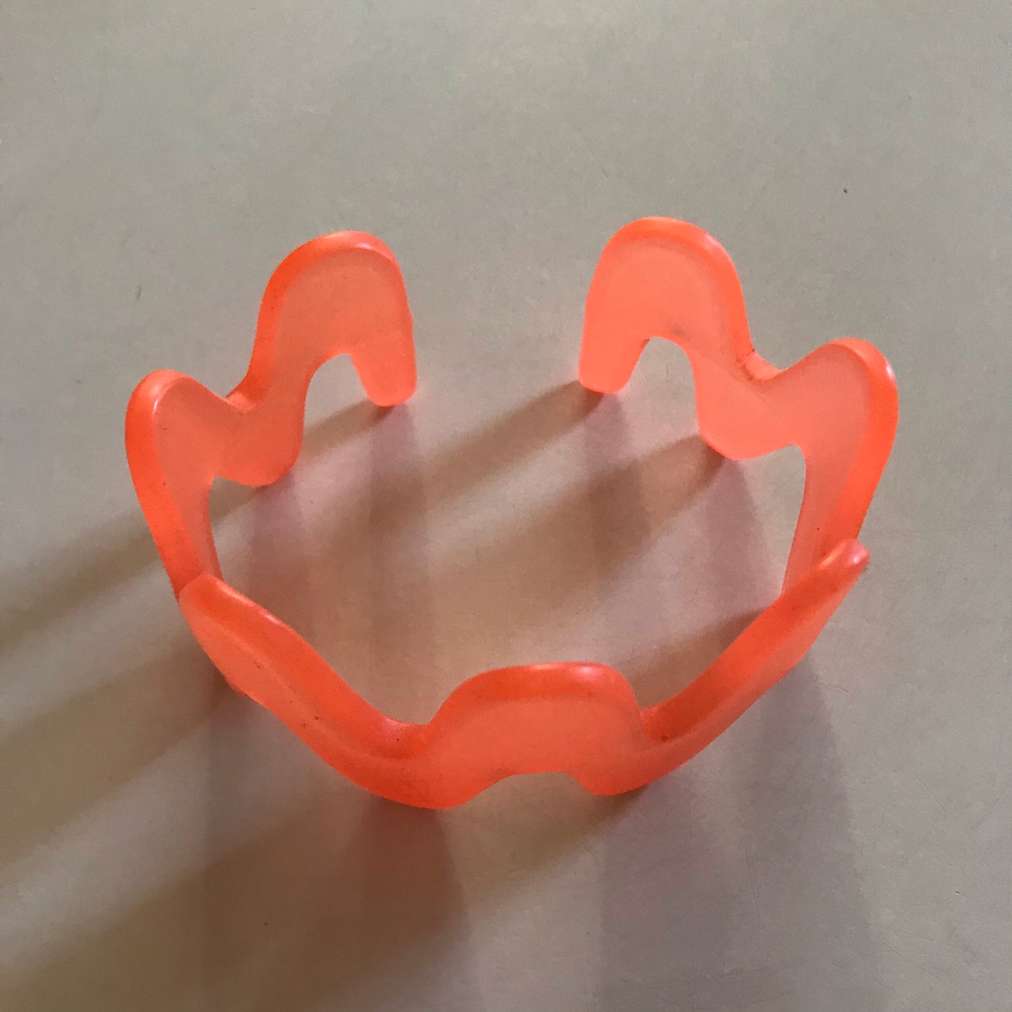Shock Wave Frosted Orange Plastic Bracelet circa 1980s