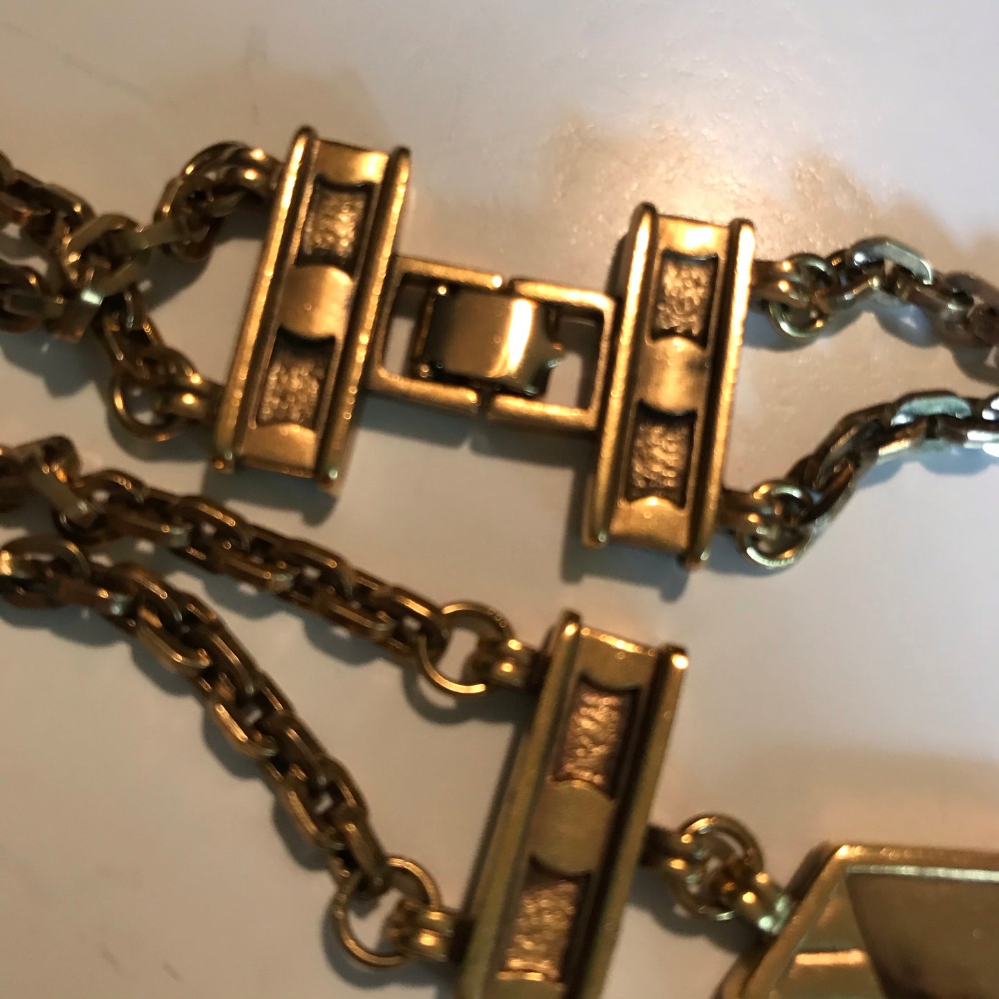 Striking Gold Tone Metal Double Chain Long Necklace with Abstract Side Links circa 1980s