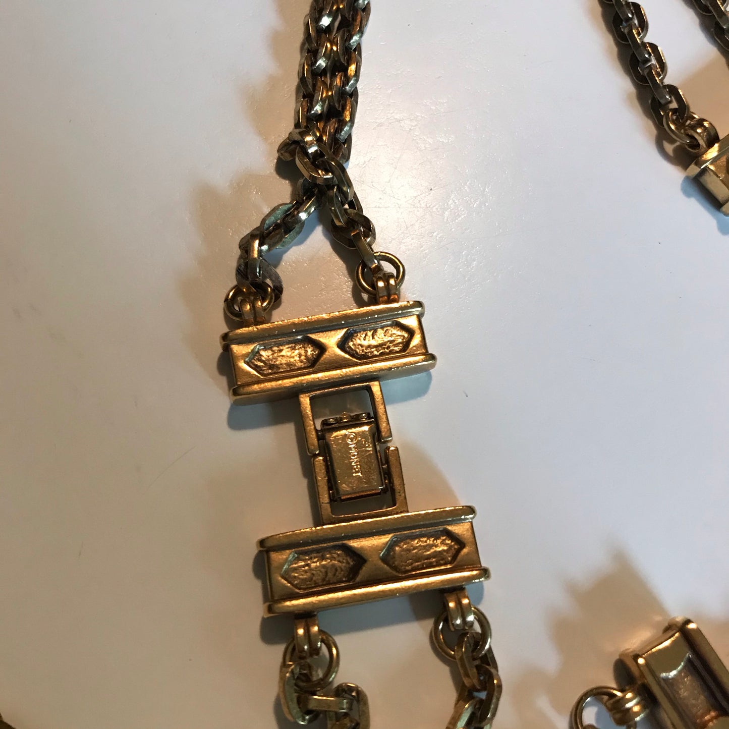 Striking Gold Tone Metal Double Chain Long Necklace with Abstract Side Links circa 1980s