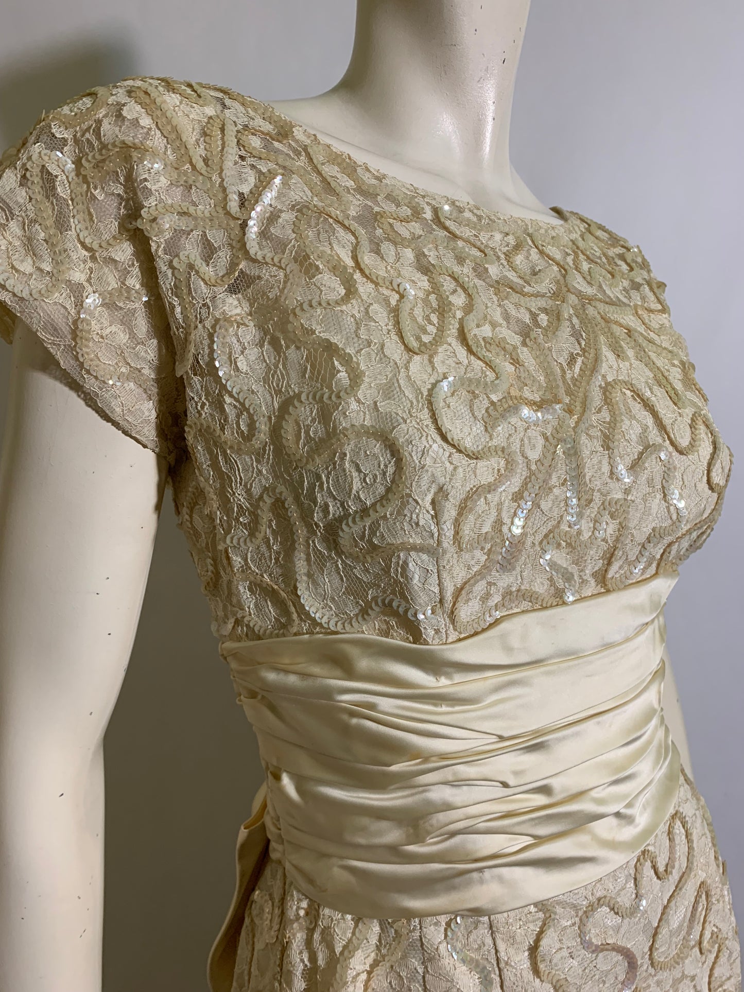 Pale Ivory Lace and Sequin Cocktail Dress with Satin Waist and Bow Back circa 1950s