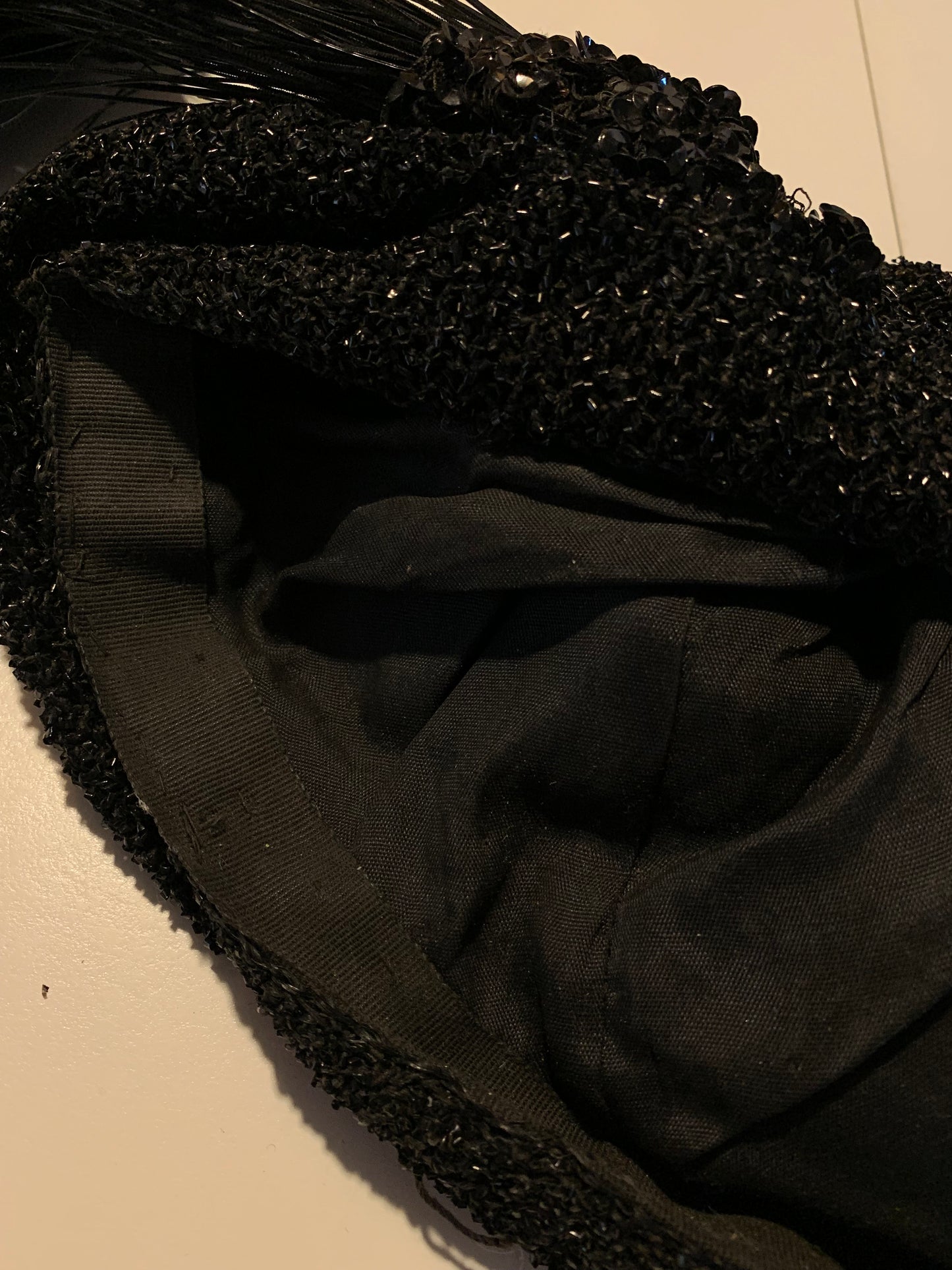 Black Bird Reimagined Metallic Turban Style Hat with Antique Feather and Sequin Accent