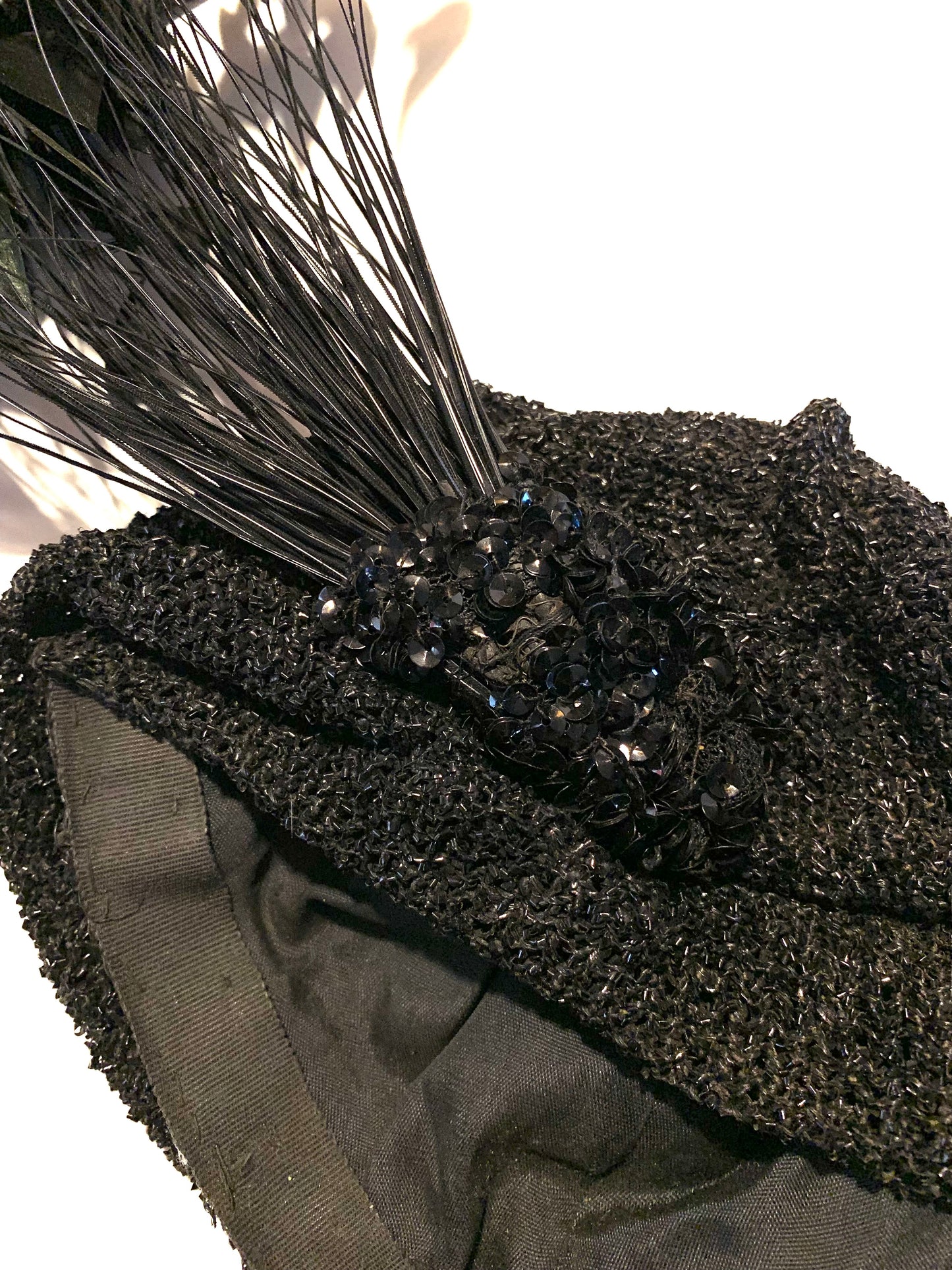 Black Bird Reimagined Metallic Turban Style Hat with Antique Feather and Sequin Accent