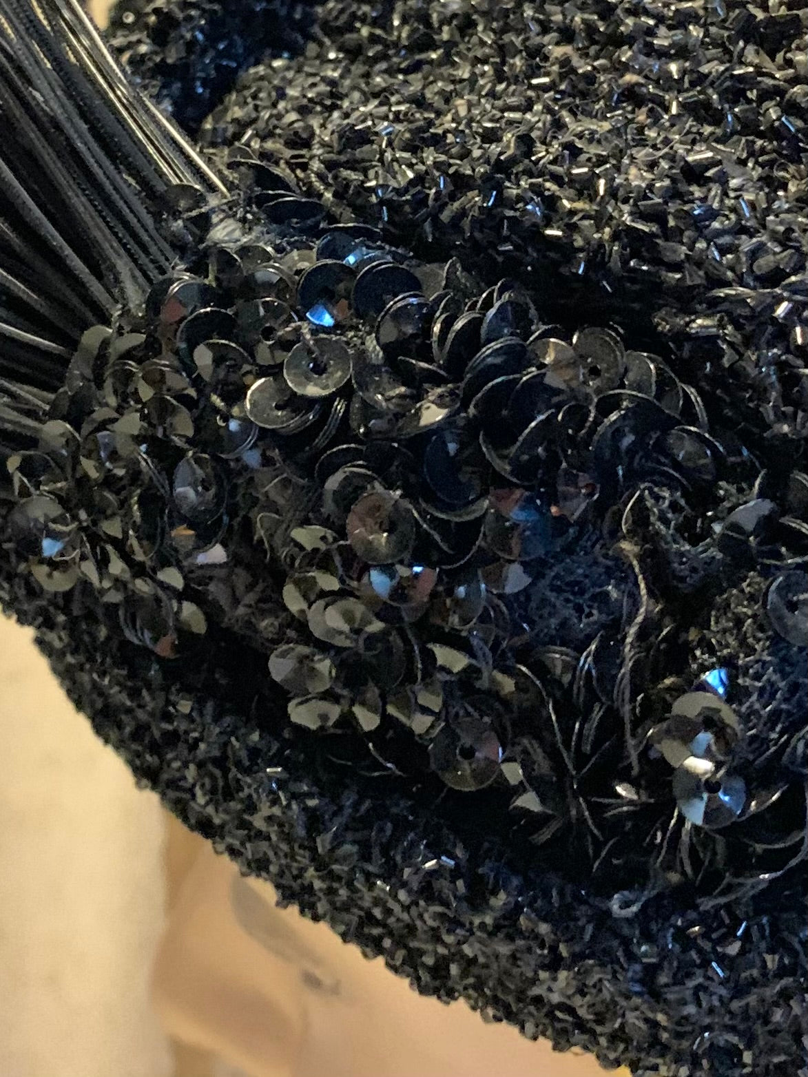 Black Bird Reimagined Metallic Turban Style Hat with Antique Feather and Sequin Accent