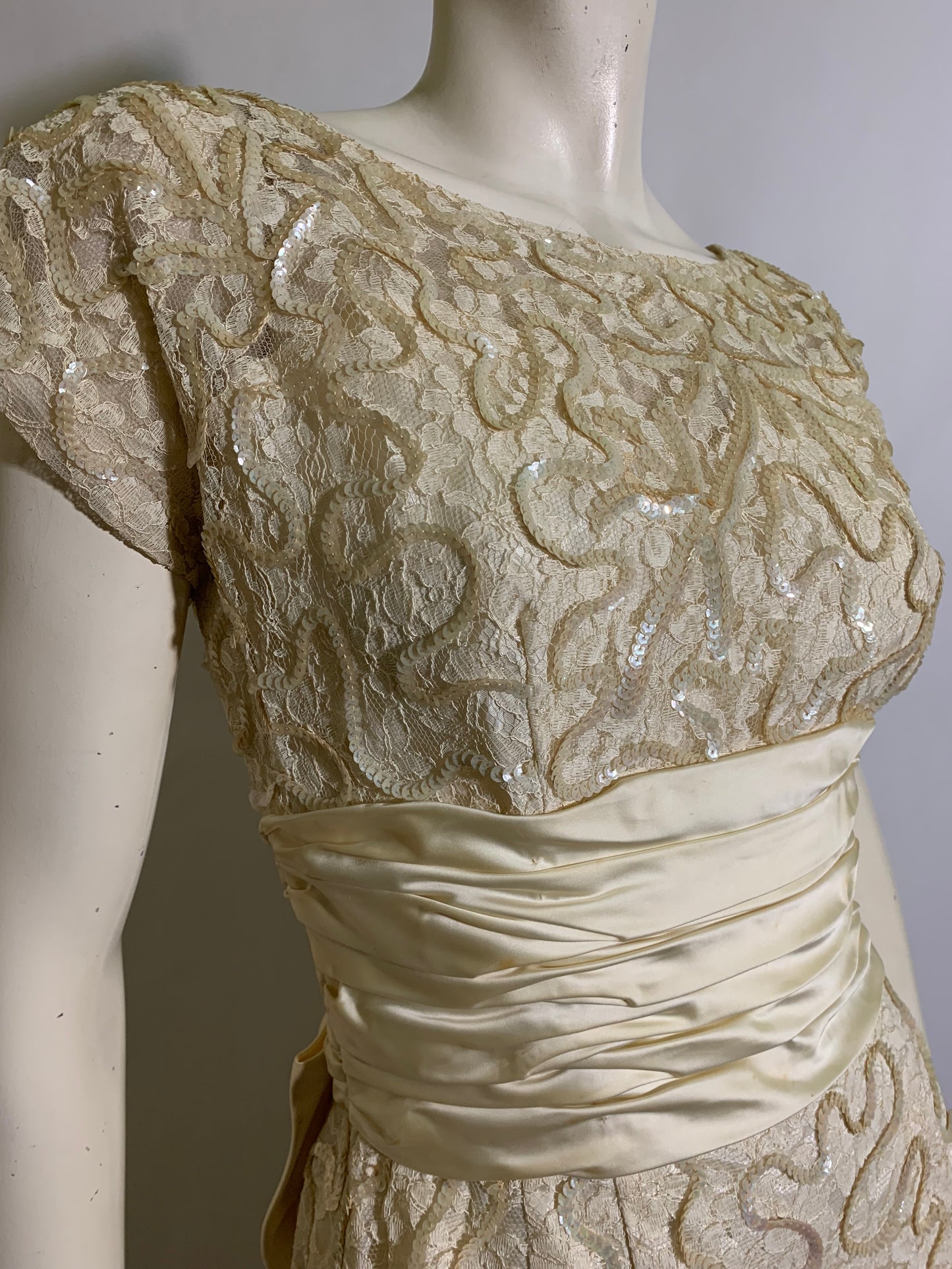Pale Ivory Lace and Sequin Cocktail Dress with Satin Waist and Bow Back circa 1950s