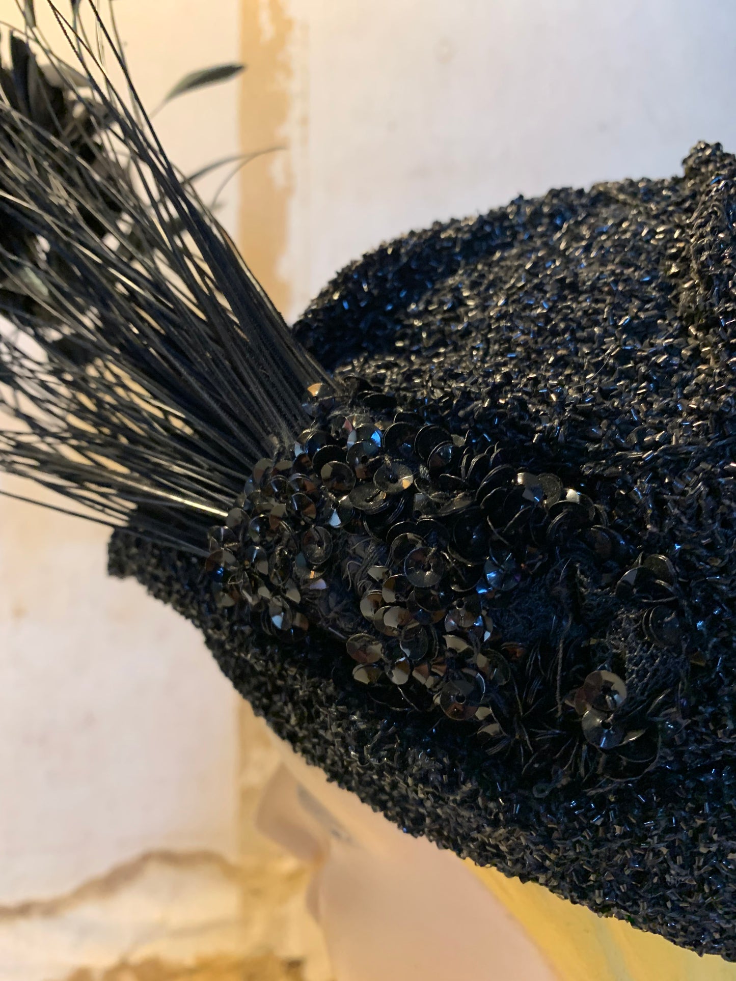 Black Bird Reimagined Metallic Turban Style Hat with Antique Feather and Sequin Accent