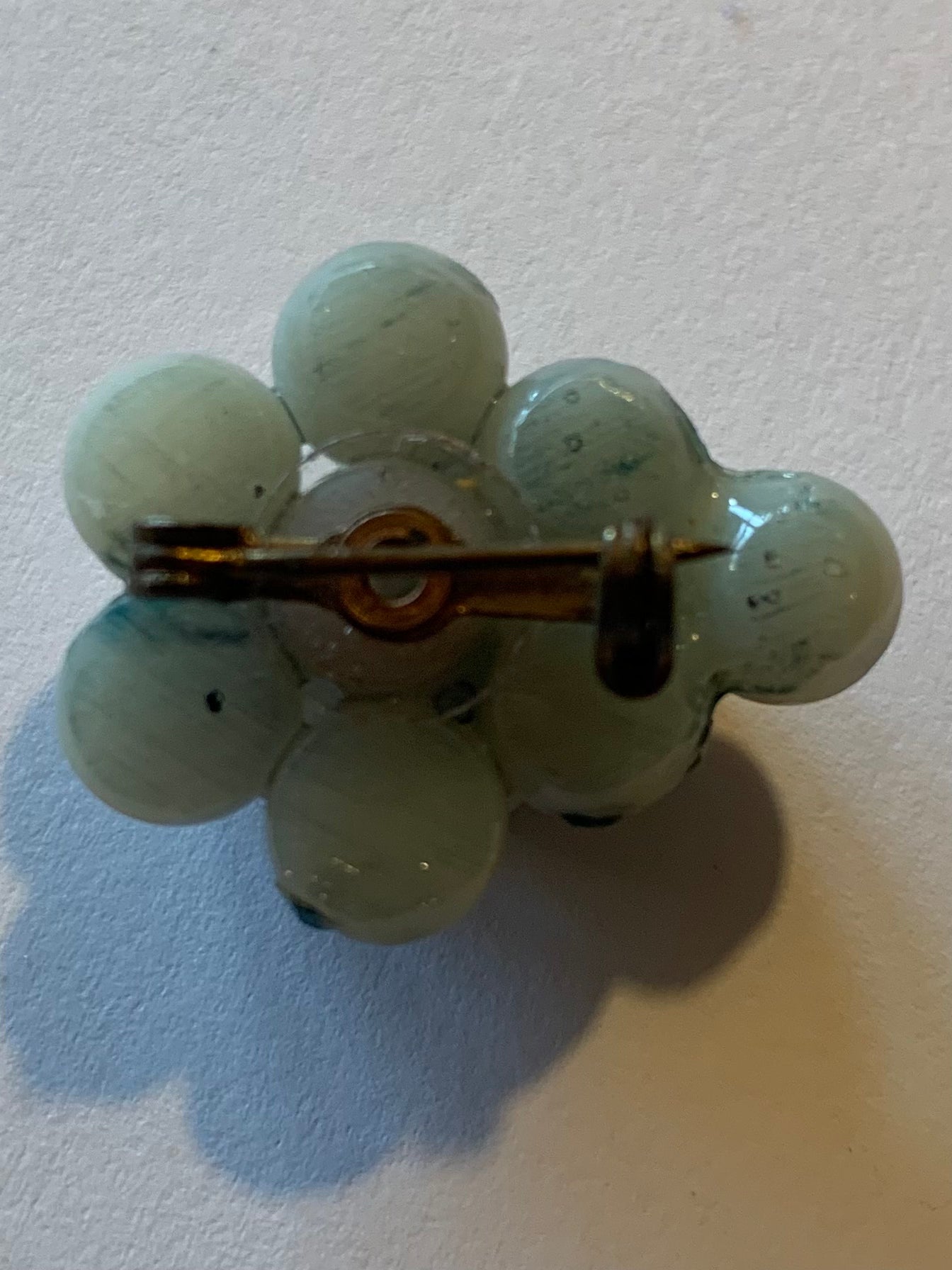 Chic Little Caviar Style Celluloid Bubble Brooch with Green Rhinestones circa 1930s