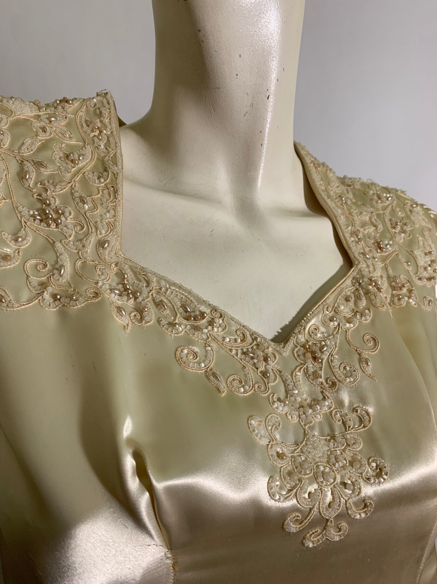 Winter White Slipped Satin Wedding Dress with Beaded Neckline and Hip Accents circa 1940s