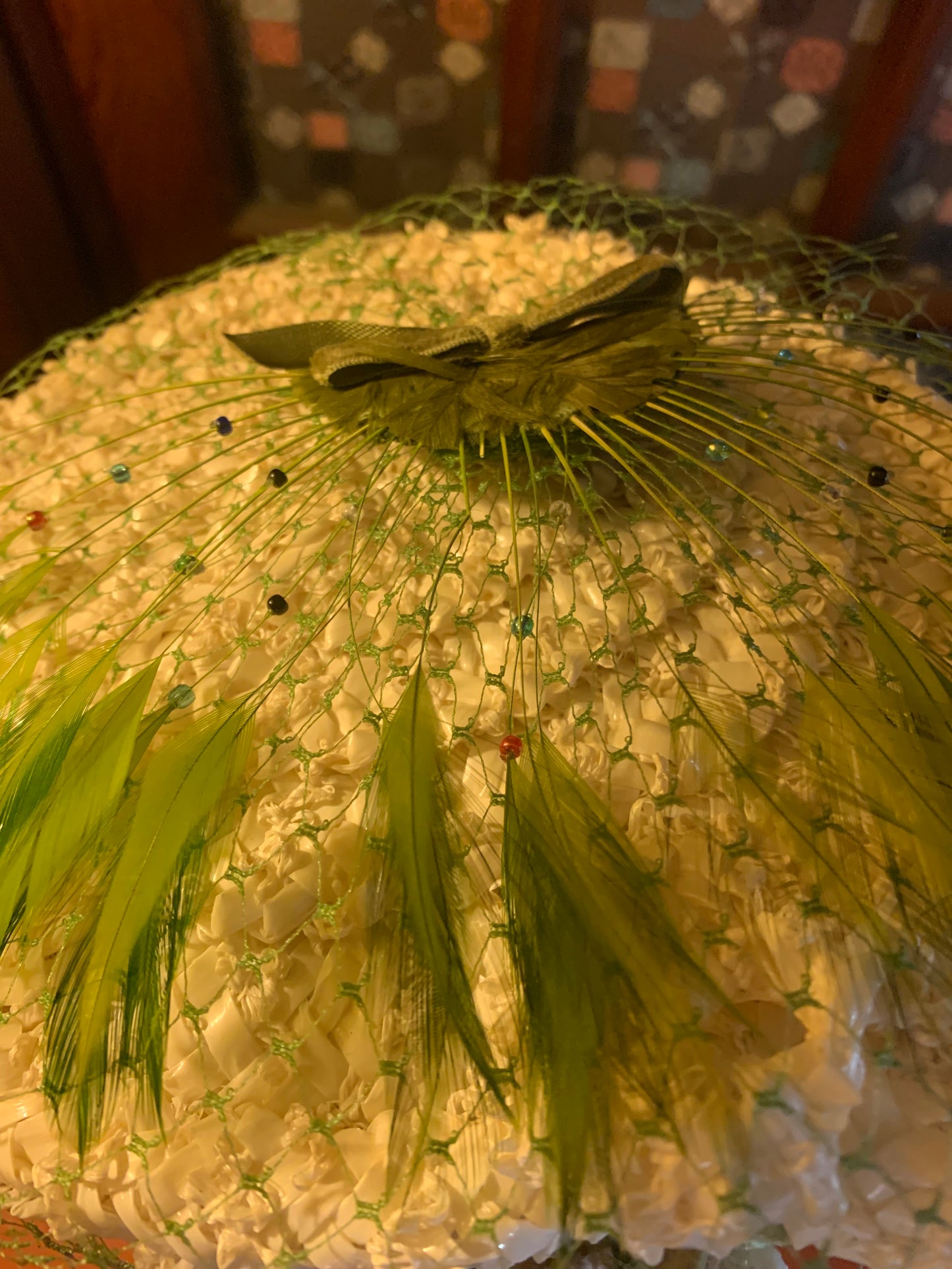 Warm Ivory Braided Sisal Pill Bow Hat with Green Feathers and Iridescent Beads circa 1960s