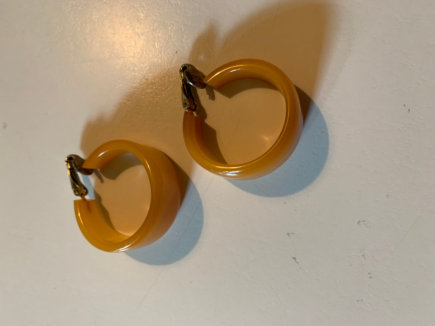 Warm Golden Yellow Bakelite Hoop Clip Earrings circa 1940s