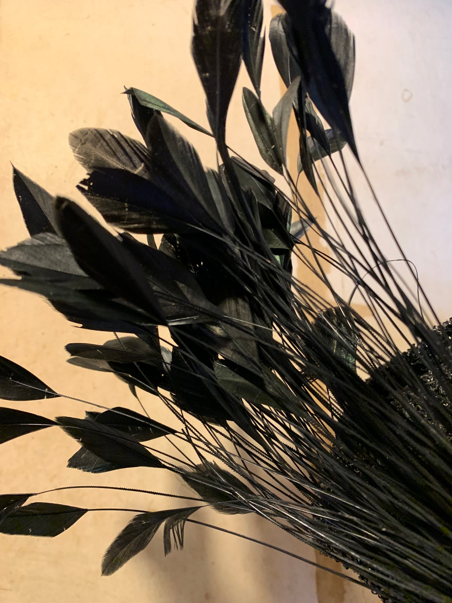 Black Bird Reimagined Metallic Turban Style Hat with Antique Feather and Sequin Accent