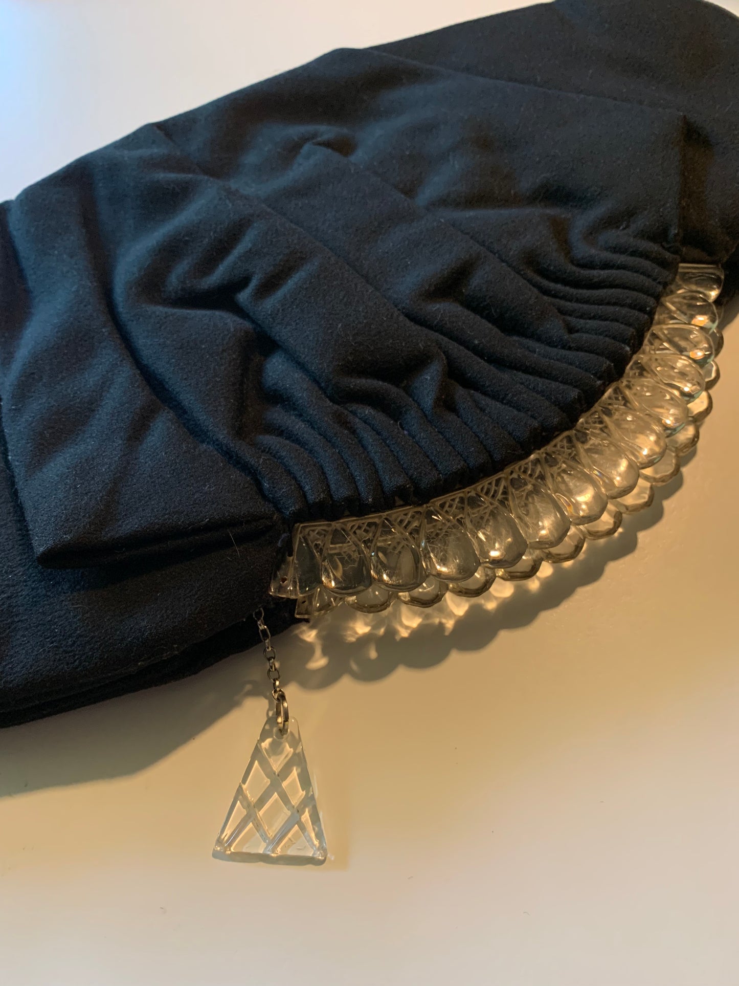 Elegant Black Wool Clutch Handbag with Carved Lucite Crown Clasp circa 1940s