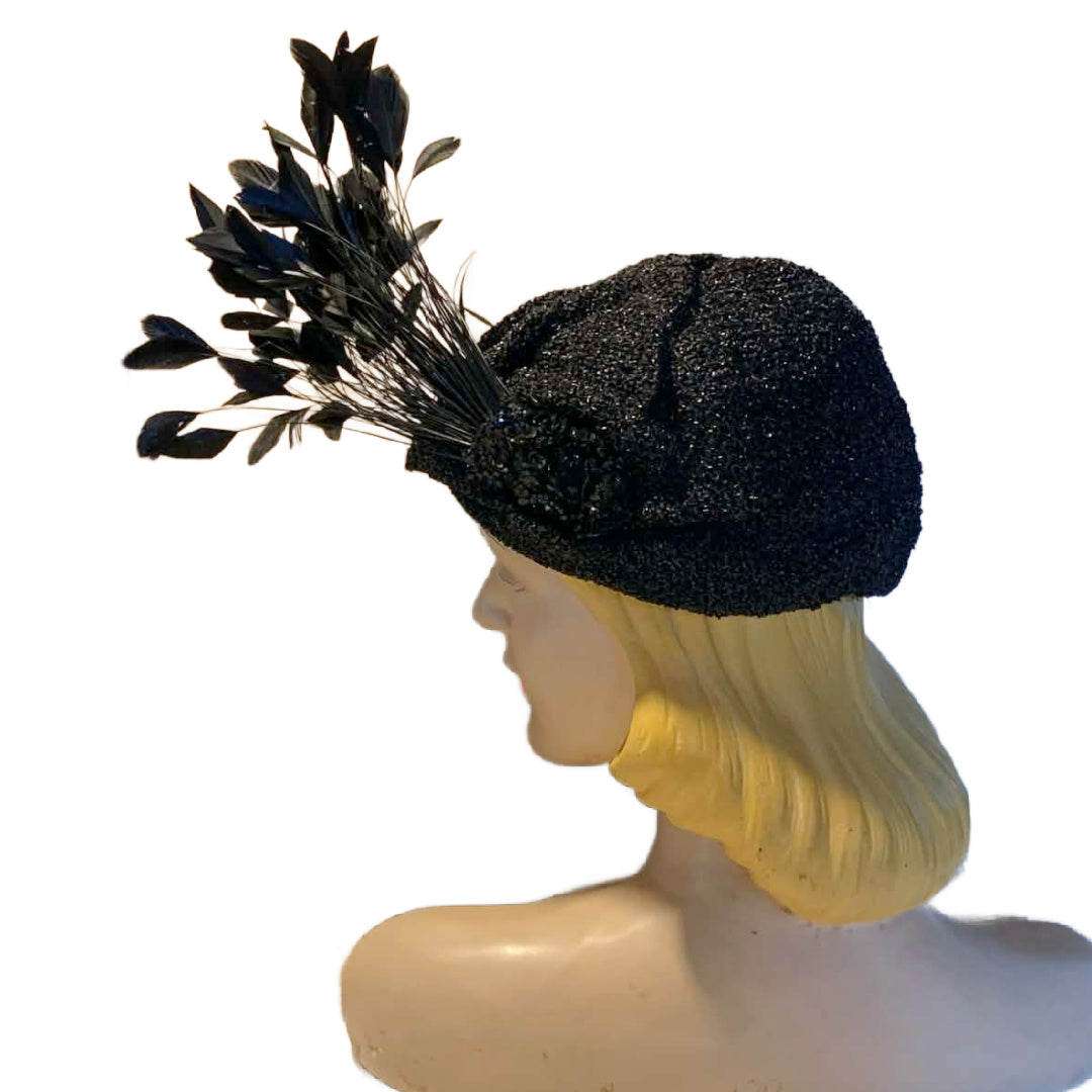 Black Bird Reimagined Metallic Turban Style Hat with Antique Feather and Sequin Accent