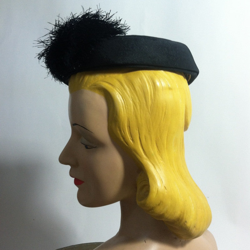 Black Whirled Mini Pillbox Hat with Fringed Accent circa 1960s Nina Neal