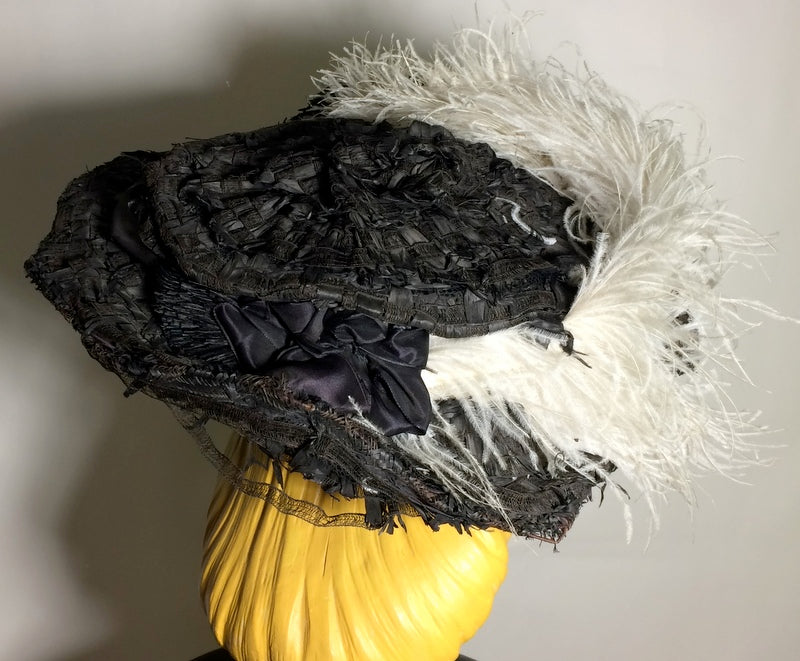 Wide Brim Black Raffia and Lace Woven Hat with Ostrich Plume circa Early 1900s