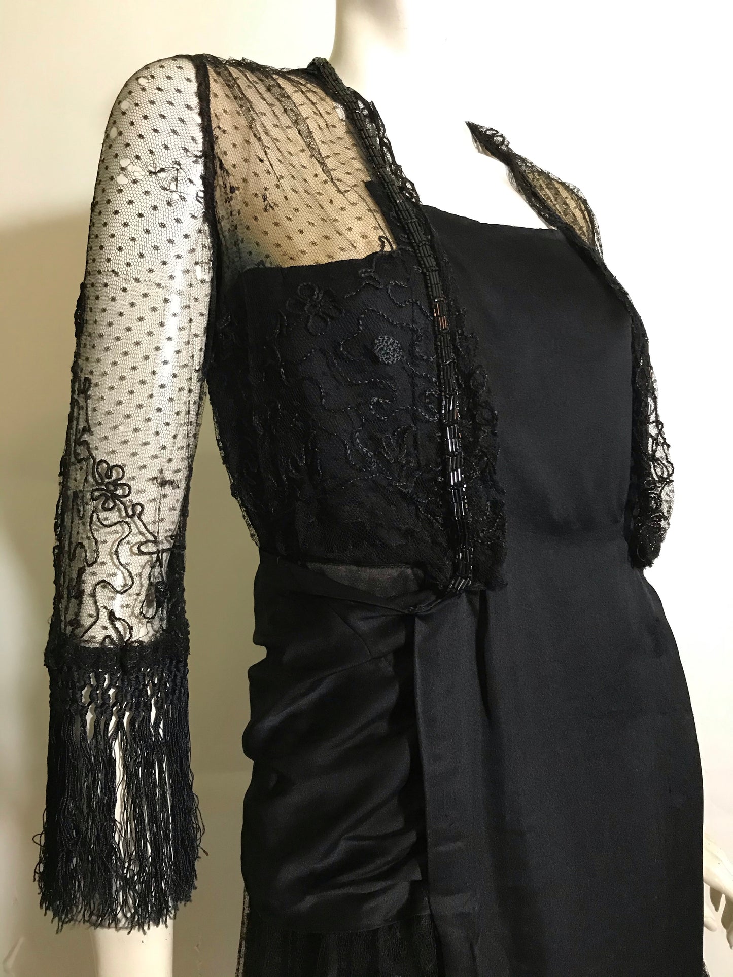 Elaborate Ink Black Silk Formal Dress with Beading Lace and Long Fringe circa 1910s