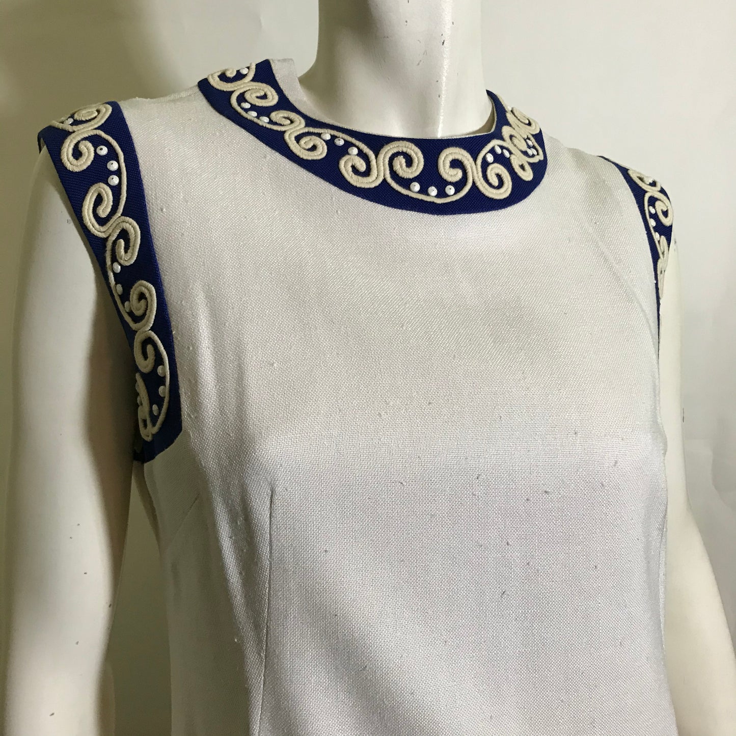 Sleeveless White Linen Weave Rayon Shift Dress with Blue and White Beaded Trim circa 1960s