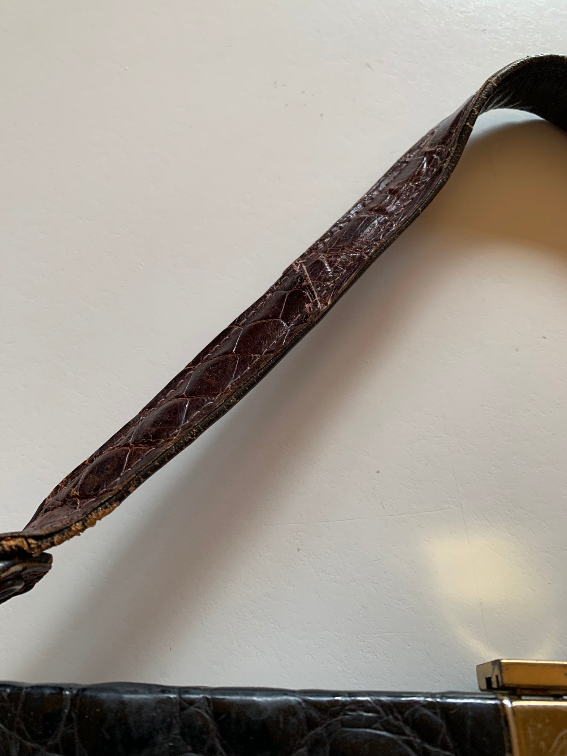 1940s-1950s brown alligator purse —, a brief history