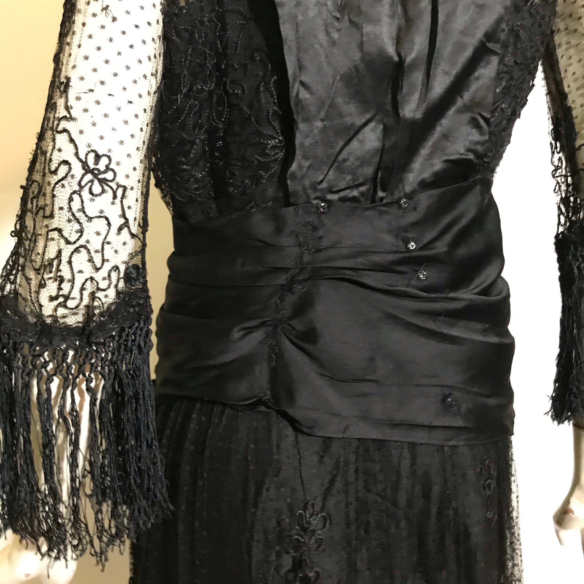 black silk and lace dress Elaborate Ink Black Silk Formal Dress with Beading Lace and Long Fringe circa 1910s