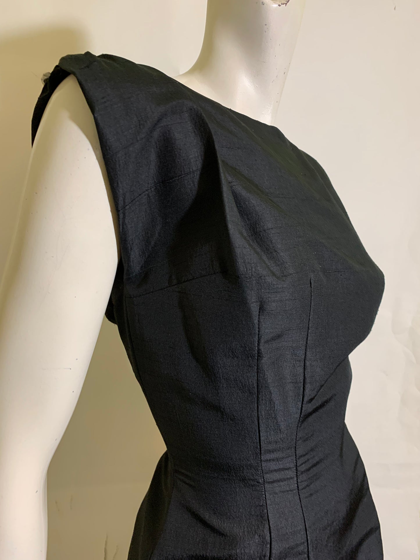 Show Stopping Figure Conscious Sleeveless Black Cocktail Dress with Daring Low Back Trimmed in Black and Red Roses circa 1950s